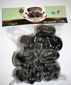 Frozen whole black Summer truffle